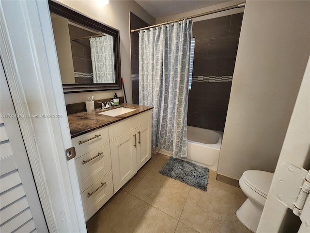 full bathroom featuring shower / bath combo, toilet, tile patterned floors, and vanity