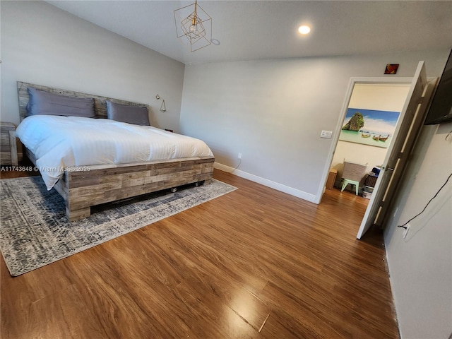 bedroom featuring dark wood-type flooring