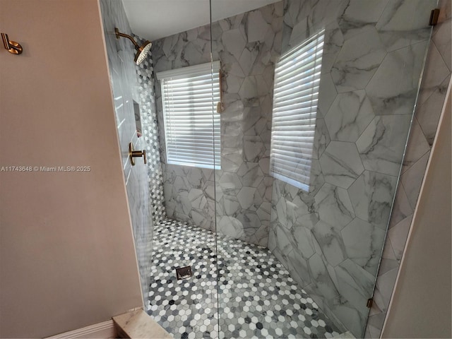 bathroom featuring tiled shower