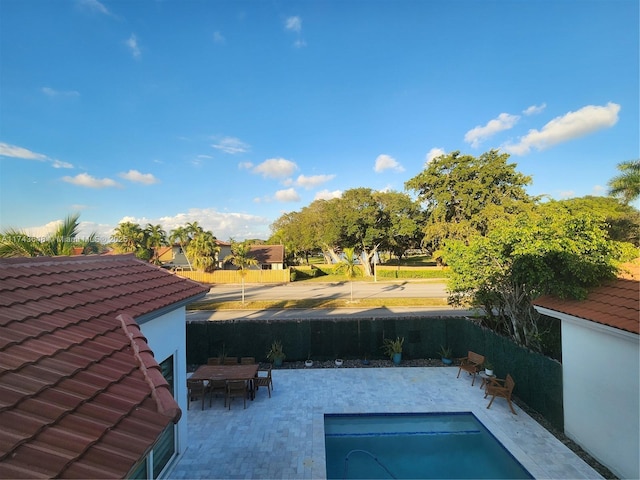 view of pool with a patio