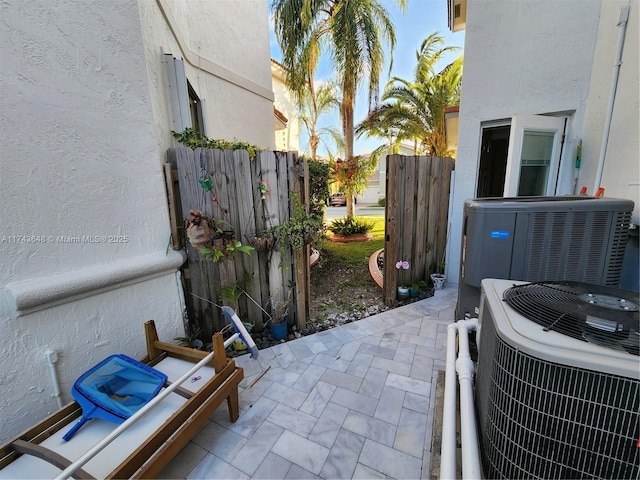 view of patio with cooling unit