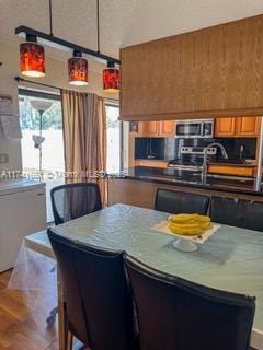 dining room with hardwood / wood-style flooring