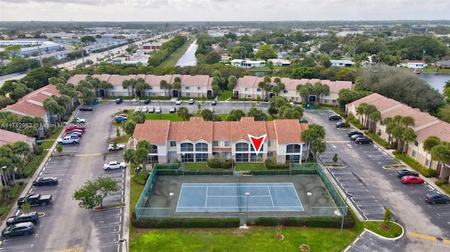 birds eye view of property with a residential view