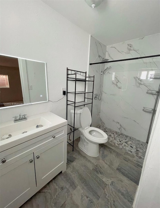 1431 NE 156th Ter, North Miami Beach, FL 33162 - bathroom featuring marble finish flooring, vanity, and a marble finish shower