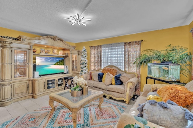 tiled living room featuring a textured ceiling