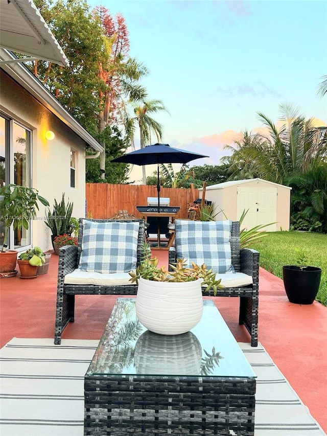 wooden terrace with area for grilling, an outdoor hangout area, an outdoor structure, fence, and outdoor dining space