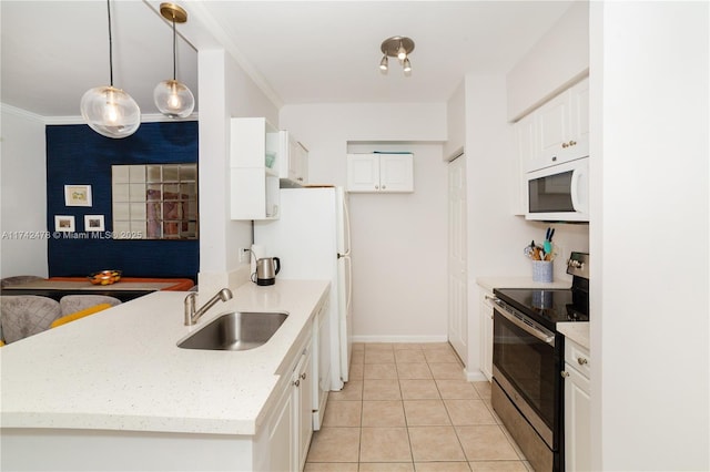 kitchen featuring sink, crown molding, decorative light fixtures, white appliances, and white cabinets