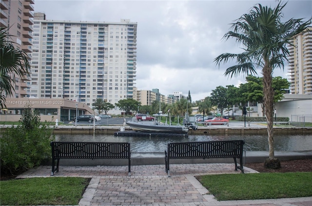 view of community with a water view