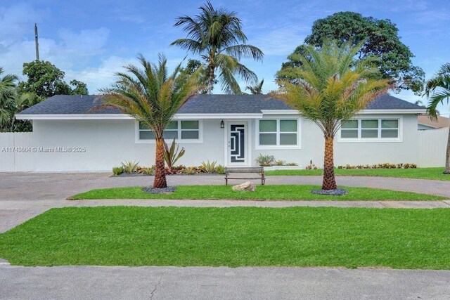 ranch-style house with a front yard