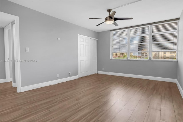 6911 Environ Blvd Unit 5L, Lauderhill, FL 33319 - unfurnished bedroom featuring light wood finished floors, a closet, and a ceiling fan