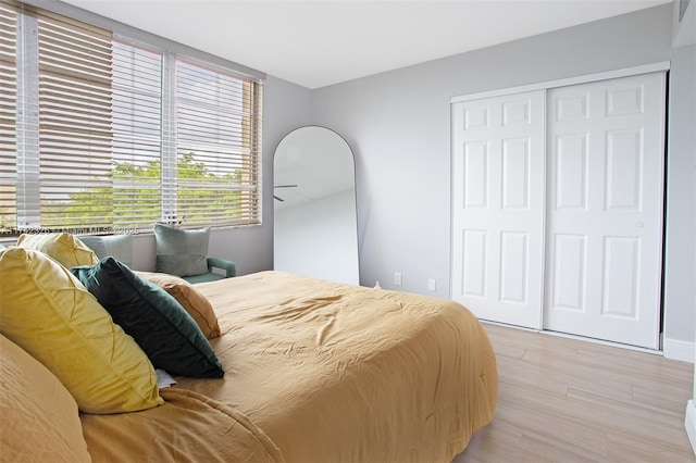 6911 Environ Blvd Unit 5L, Lauderhill, FL 33319 - bedroom with light wood finished floors and a closet