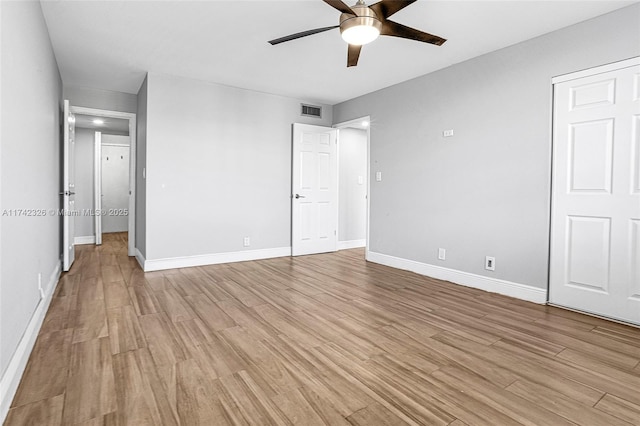6911 Environ Blvd Unit 5L, Lauderhill, FL 33319 - unfurnished bedroom featuring light wood-style floors and a ceiling fan