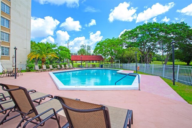 6911 Environ Blvd Unit 5L, Lauderhill, FL 33319 - community pool with a patio