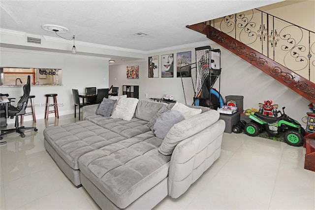 tiled living room with ornamental molding