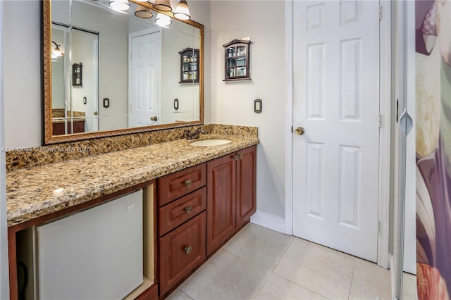 bathroom with vanity and tile patterned floors