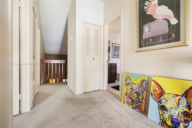 recreation room with light colored carpet