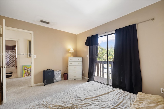 bedroom with carpet floors and access to outside