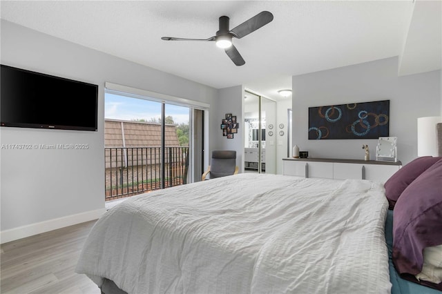 bedroom featuring light hardwood / wood-style flooring, access to outside, and ceiling fan