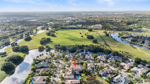 drone / aerial view with a water view