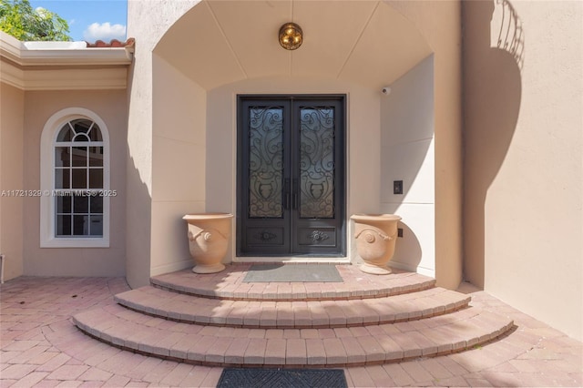 view of exterior entry with french doors