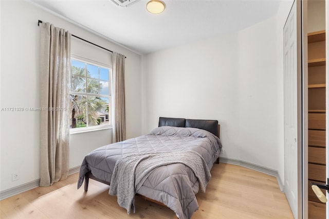 bedroom featuring light hardwood / wood-style floors