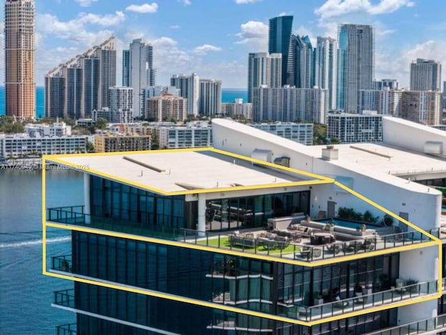 property's view of city with a water view