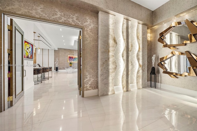 5000 Island Estates Dr Unit Ph1508, Aventura, FL 33160 - stairway featuring wallpapered walls and marble tiled floors