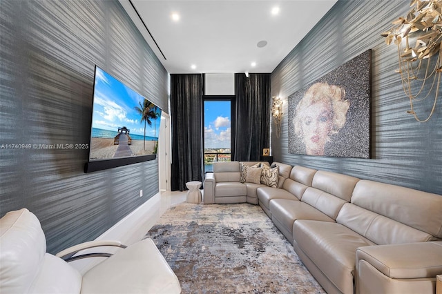 tiled living area with floor to ceiling windows and recessed lighting
