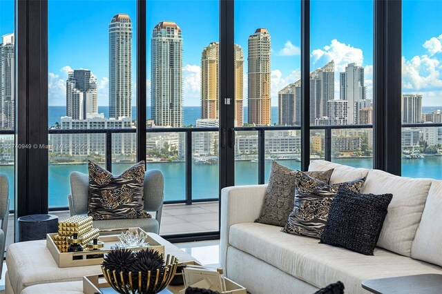 5000 Island Estates Dr Unit Ph1508, Aventura, FL 33160 - living room with a skyline view and a water view
