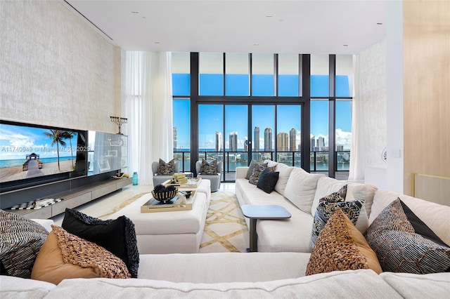 5000 Island Estates Dr Unit Ph1508, Aventura, FL 33160 - living area featuring a towering ceiling, a view of skyline, and a wall of windows