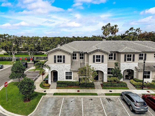 view of front of home with a front yard