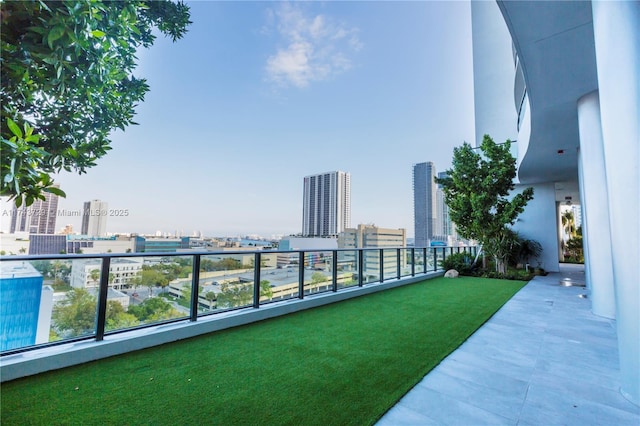 balcony featuring a city view