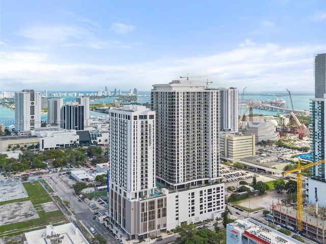 bird's eye view featuring a view of city and a water view