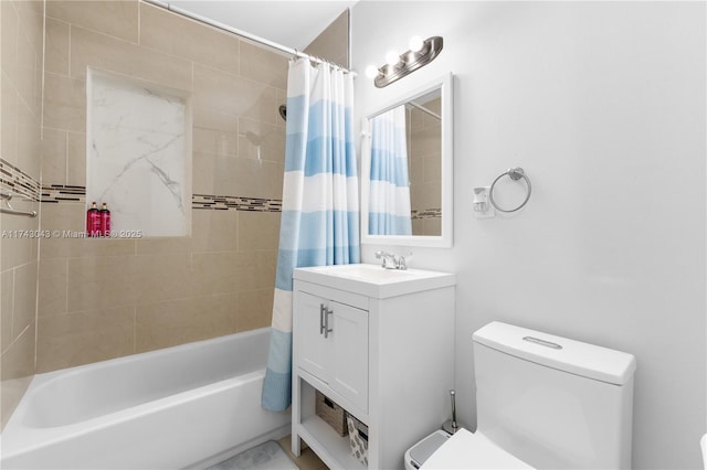 full bath with vanity, shower / bath combination with curtain, and toilet