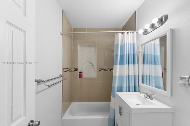 full bathroom with shower / bath combo with shower curtain and vanity