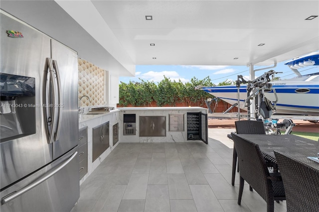 view of patio / terrace featuring an outdoor kitchen