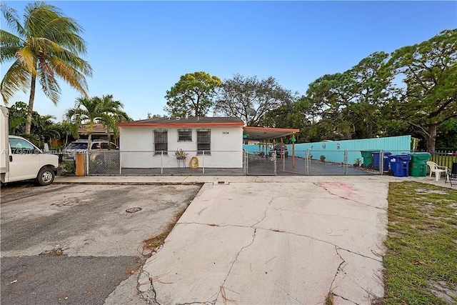 view of front of house with a carport