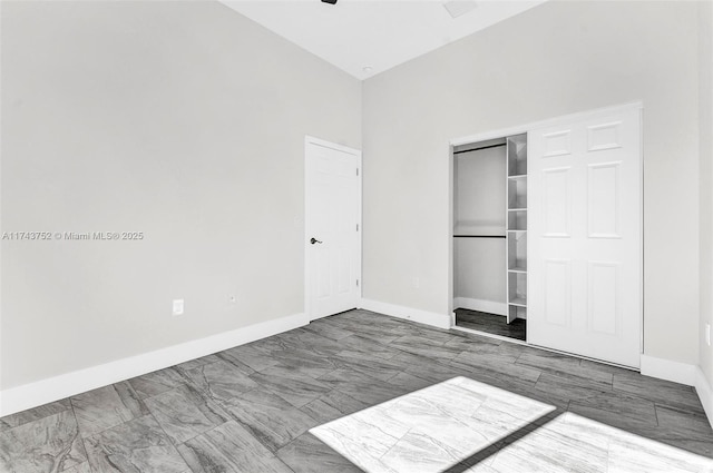 unfurnished bedroom with a closet