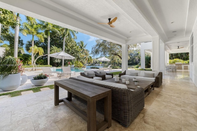 view of patio / terrace featuring ceiling fan and an outdoor hangout area