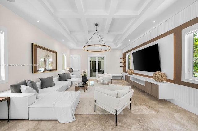 living room with coffered ceiling and beamed ceiling