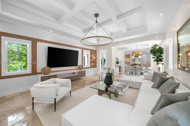 living room with beamed ceiling and coffered ceiling