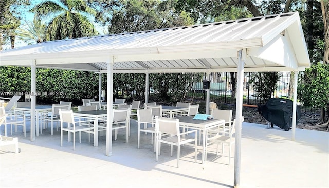 view of patio / terrace featuring a gazebo and grilling area