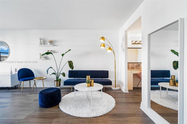 living room with dark hardwood / wood-style flooring