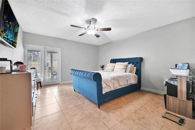 bedroom with french doors, a textured ceiling, light tile patterned floors, ceiling fan, and access to exterior