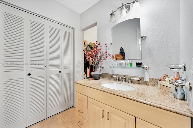 bathroom featuring vanity and tile patterned floors