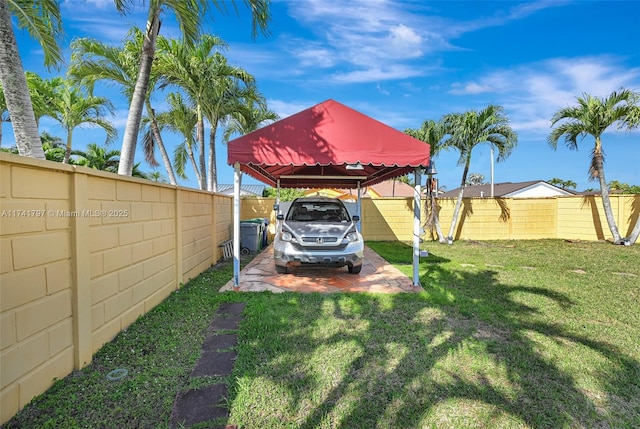 view of yard featuring a carport