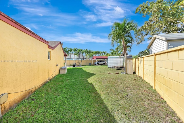 view of yard with a shed