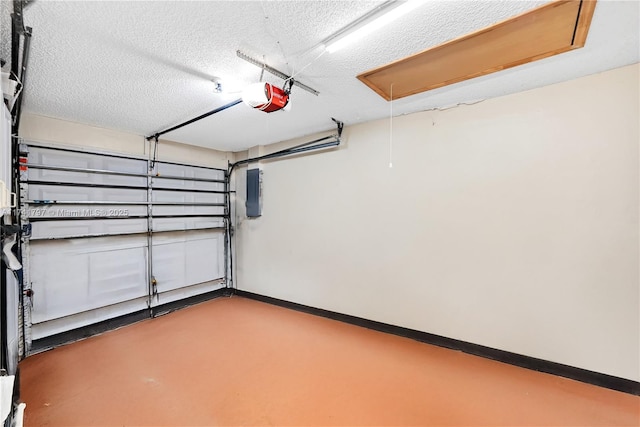 garage featuring a garage door opener and electric panel