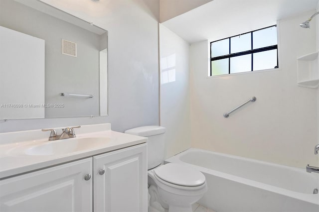 bathroom with toilet,  shower combination, vanity, and visible vents