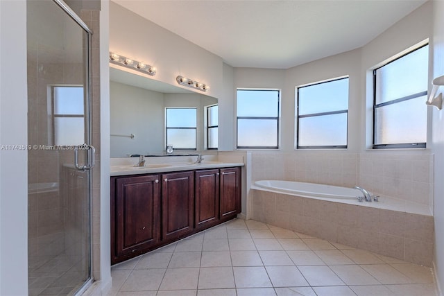 bathroom featuring vanity, separate shower and tub, and tile patterned flooring